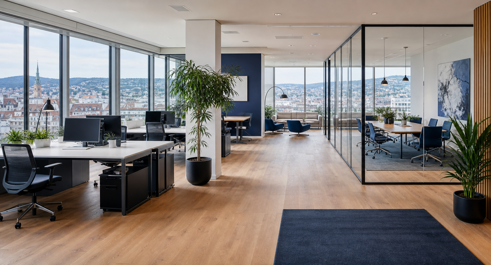 Bürofläche in Wien mit Arbeitsplätzen und Stadtblick.